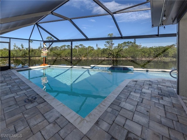 pool with a lanai and a patio area