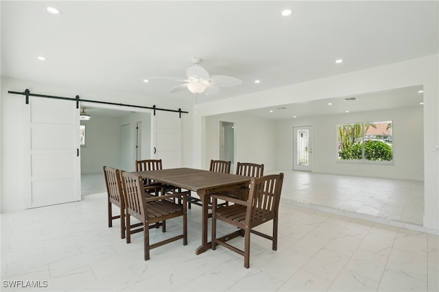 8 Bayview Blvd, Fort Myers Beach, FL 33931 - dining room featuring a ceiling fan, marble finish floor, recessed lighting, and a barn door
