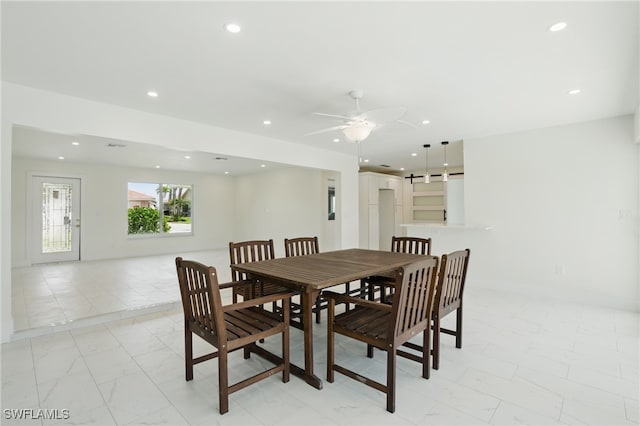 8 Bayview Blvd, Fort Myers Beach, FL 33931 - dining area featuring a ceiling fan, marble finish floor, and recessed lighting