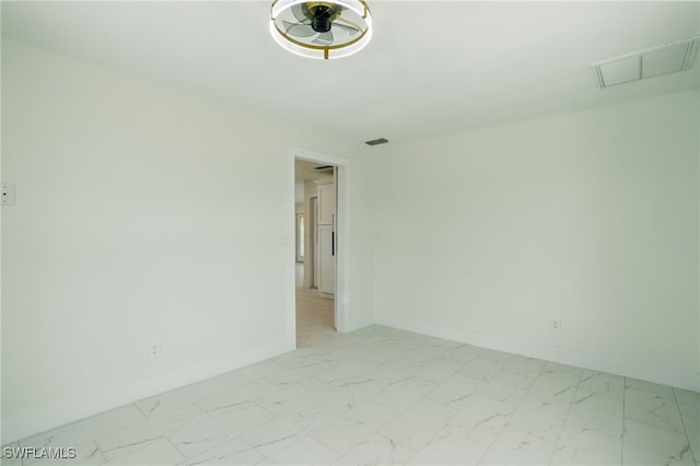 8 Bayview Blvd, Fort Myers Beach, FL 33931 - spare room featuring baseboards, marble finish floor, and visible vents