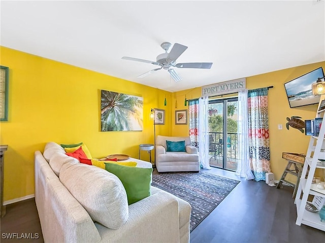 interior space with baseboards and a ceiling fan