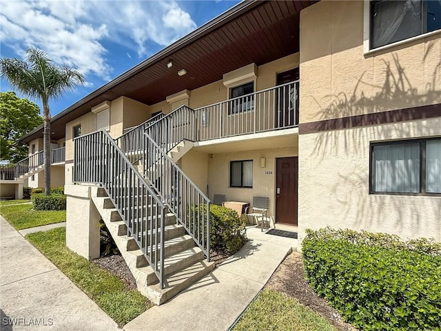 view of building exterior with stairs