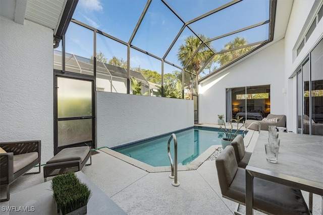 pool with a patio and a lanai