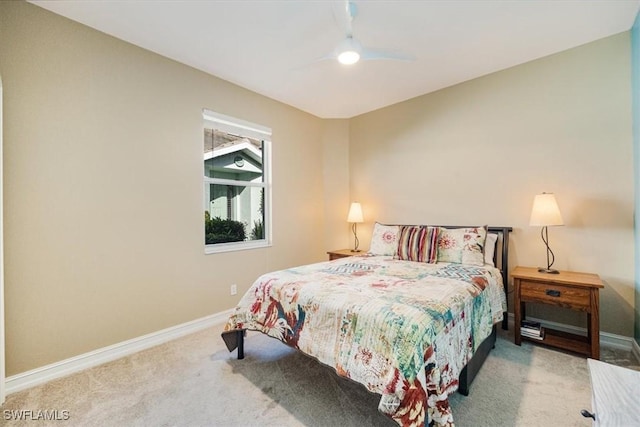 bedroom with baseboards, carpet, and ceiling fan