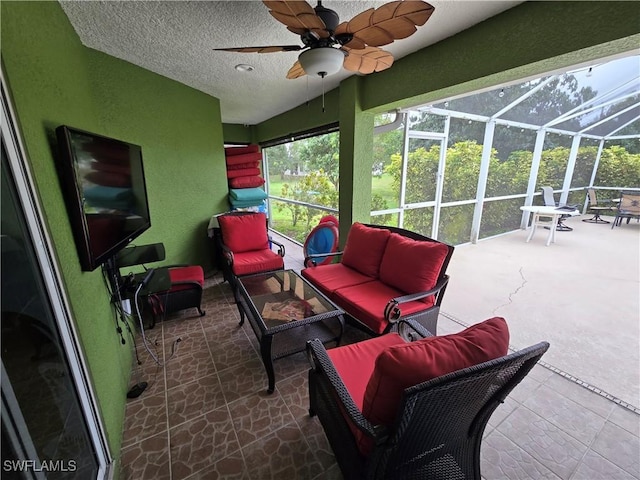 144 Carlisle Ave S, Lehigh Acres, FL 33974 - sunroom featuring outdoor lounge area and ceiling fan