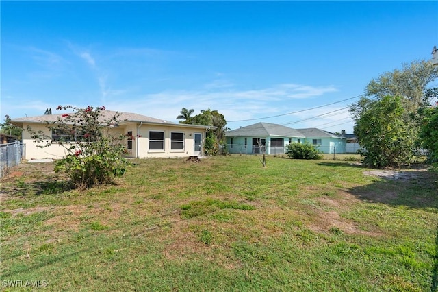 view of yard featuring fence