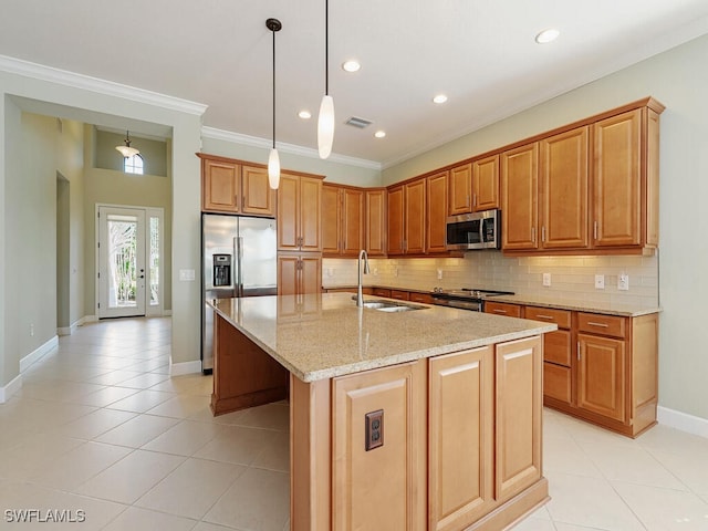 kitchen featuring appliances with stainless steel finishes, backsplash, a sink, and visible vents