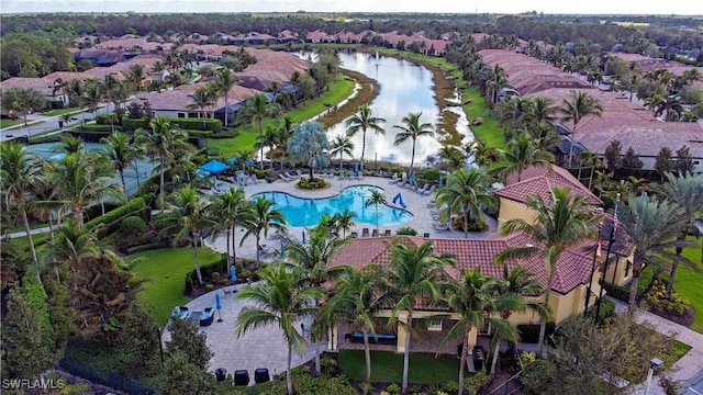 bird's eye view with a water view