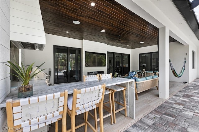 view of patio / terrace featuring outdoor dry bar