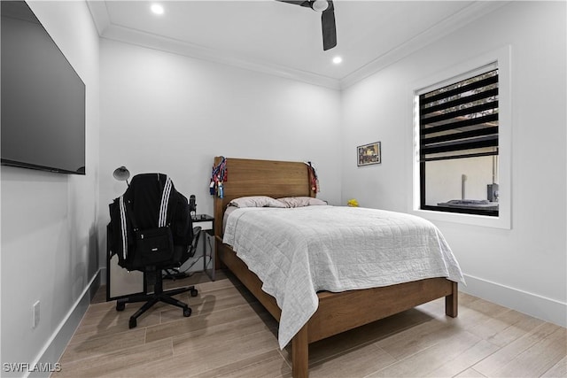 bedroom with recessed lighting, a ceiling fan, baseboards, ornamental molding, and light wood finished floors