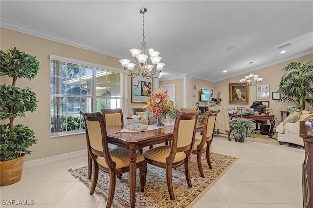 dining area featuring ornamental molding, visible vents, and an inviting chandelier