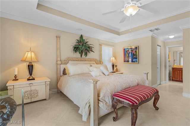 bedroom featuring light tile patterned floors, baseboards, a raised ceiling, ceiling fan, and ornamental molding