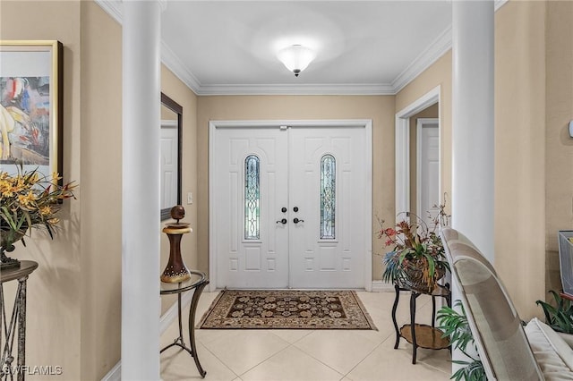 tiled entrance foyer with ornamental molding