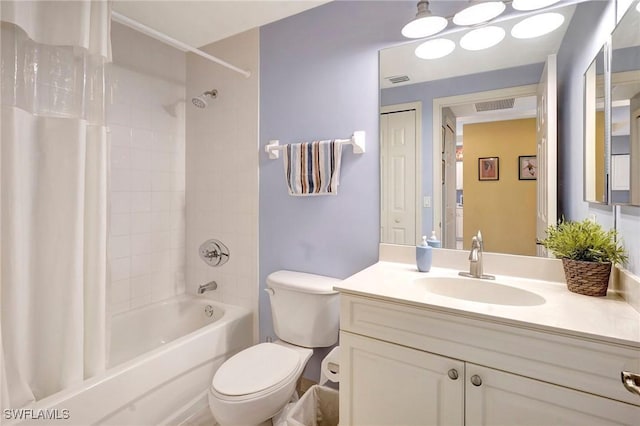 bathroom featuring visible vents, shower / bathtub combination with curtain, toilet, and vanity