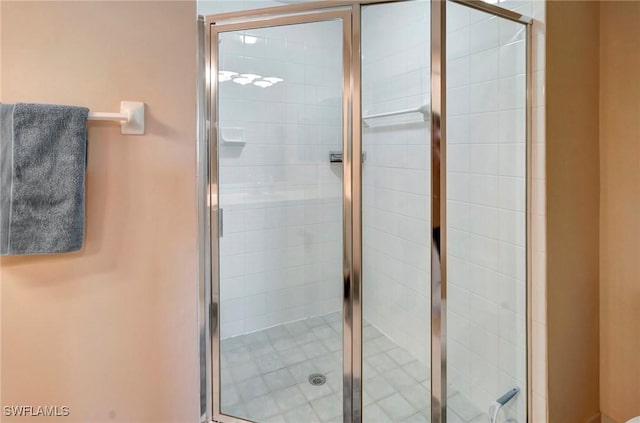 bathroom featuring a stall shower