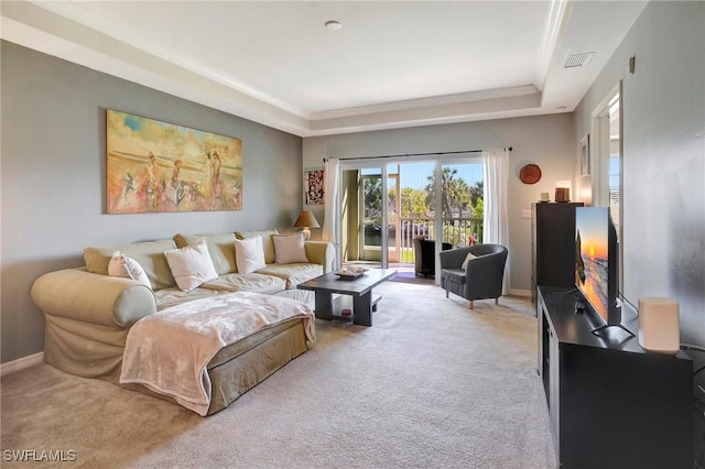 living room featuring carpet, visible vents, and crown molding