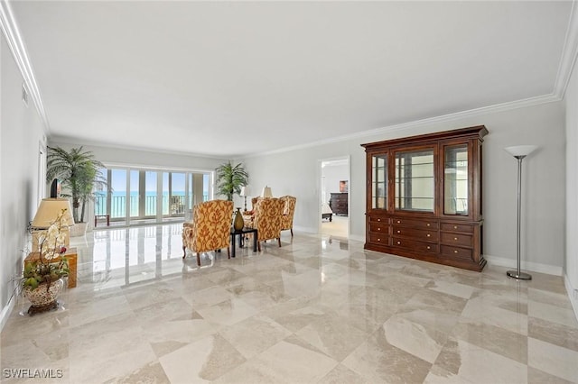 unfurnished living room with ornamental molding, marble finish floor, and baseboards