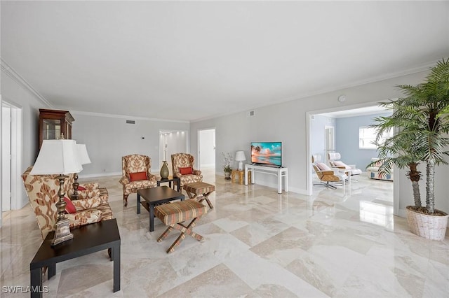 living room with marble finish floor, visible vents, baseboards, and crown molding