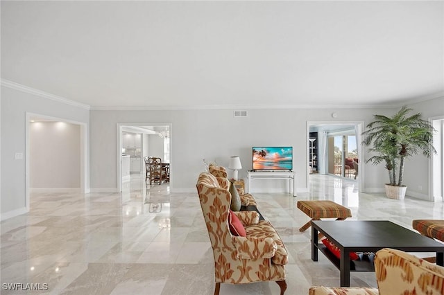 living room featuring marble finish floor, ornamental molding, visible vents, and baseboards