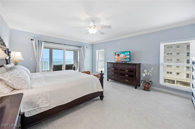 bedroom featuring access to outside, light carpet, and crown molding