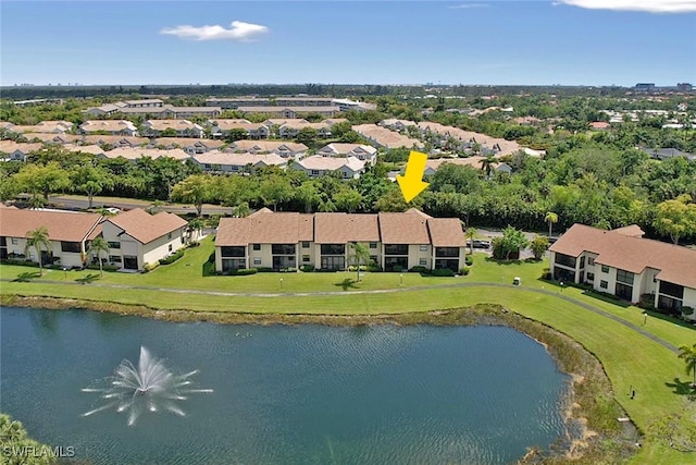 aerial view with a water view and a residential view