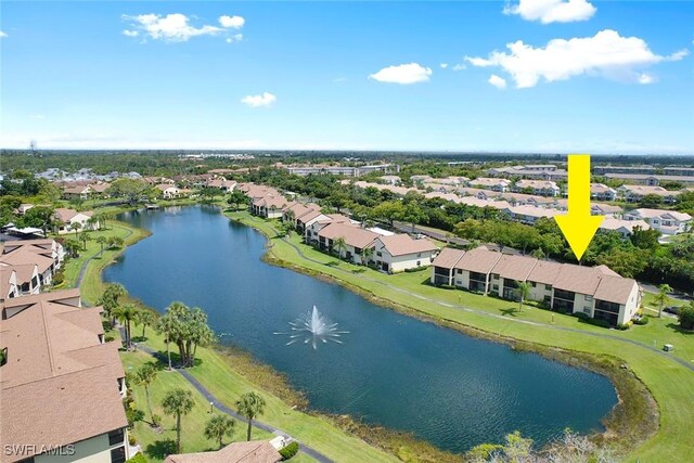 aerial view with a water view and a residential view