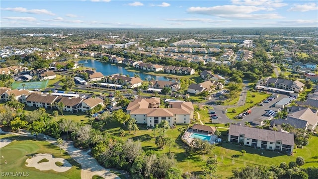 aerial view featuring a residential view and a water view