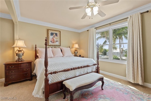 bedroom featuring ornamental molding, light colored carpet, ceiling fan, and baseboards