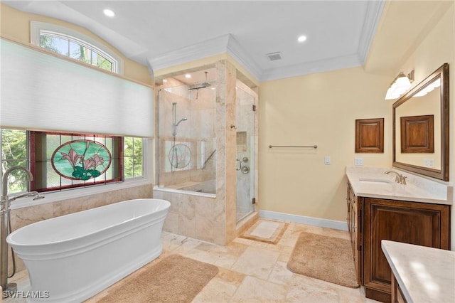 full bath featuring a freestanding bath, a stall shower, vanity, and crown molding