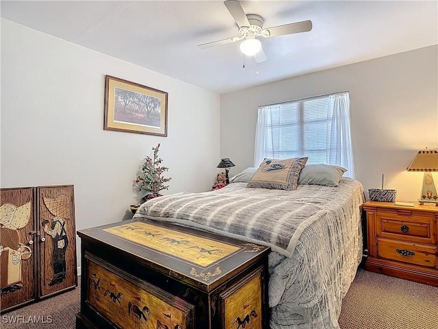 carpeted bedroom featuring a ceiling fan