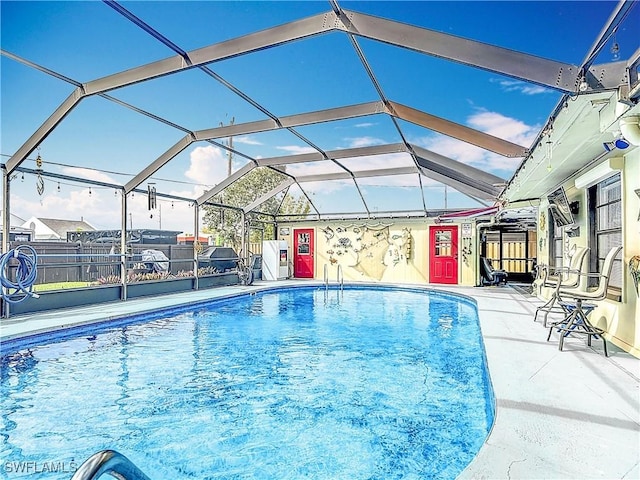 view of swimming pool featuring a fenced in pool, glass enclosure, a patio, and fence