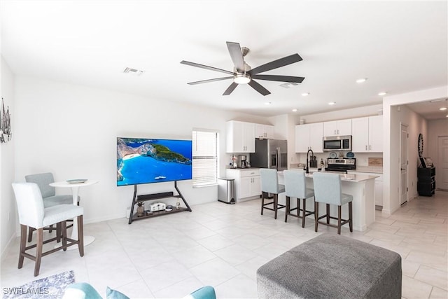 14239 Oviedo Pl, Fort Myers, FL 33905 - living room with baseboards, a ceiling fan, visible vents, and recessed lighting