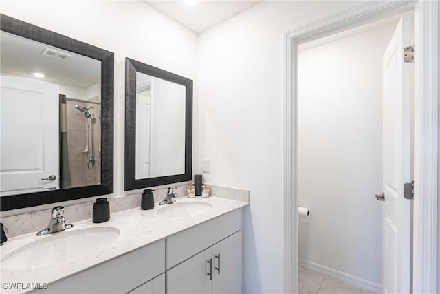 14239 Oviedo Pl, Fort Myers, FL 33905 - full bathroom featuring double vanity, visible vents, a sink, and tile patterned floors