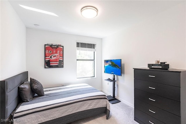 14239 Oviedo Pl, Fort Myers, FL 33905 - bedroom featuring light carpet and baseboards