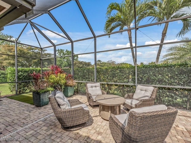 view of patio / terrace with a lanai