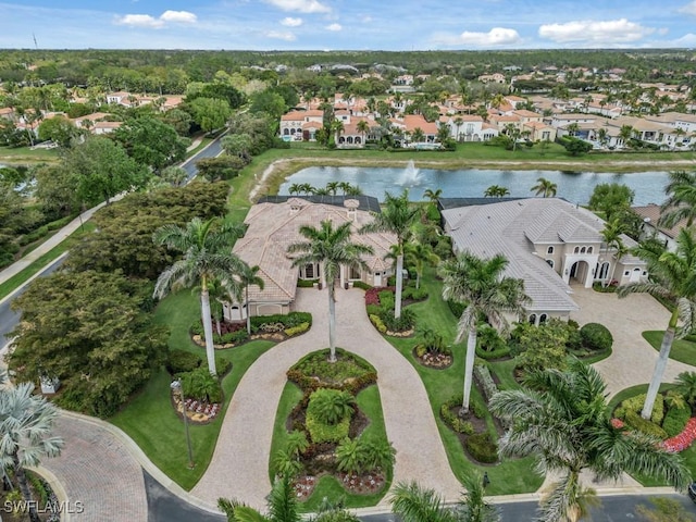 birds eye view of property featuring a residential view and a water view