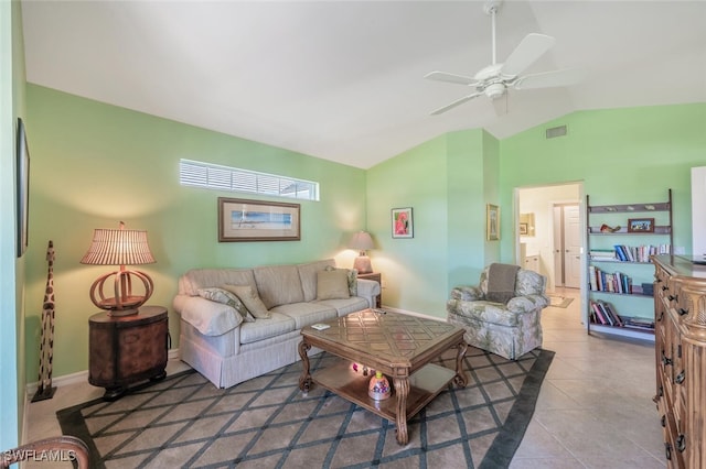 living room with visible vents, a ceiling fan, tile patterned flooring, baseboards, and vaulted ceiling