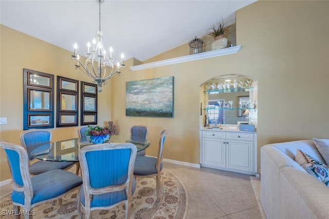 dining area with an inviting chandelier, vaulted ceiling, light tile patterned floors, and baseboards