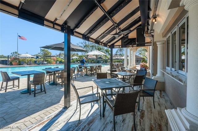 view of patio featuring a community pool