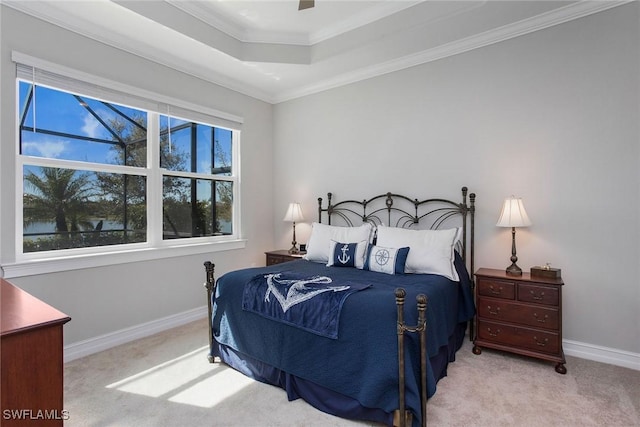 bedroom featuring baseboards, carpet floors, and crown molding