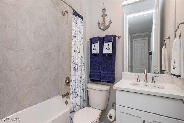 full bath with vanity, toilet, crown molding, and shower / bath combo