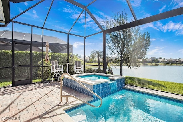 view of swimming pool featuring a water view, a pool with connected hot tub, a lanai, and a patio area