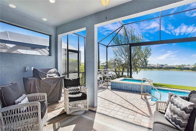 interior space with glass enclosure, a water view, and a pool with connected hot tub