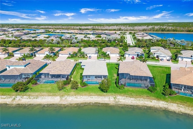 bird's eye view with a residential view and a water view