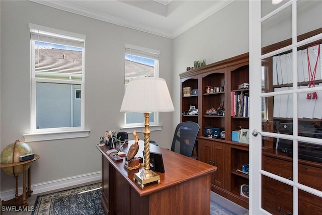 office area with dark wood-style flooring, baseboards, and ornamental molding