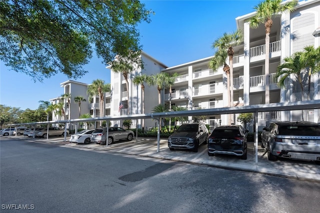 view of property with covered parking