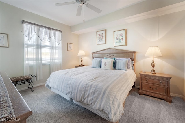 bedroom featuring baseboards, a ceiling fan, and carpet flooring