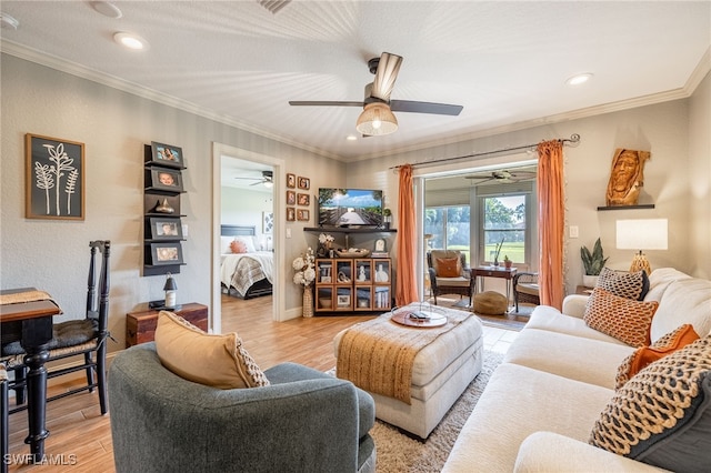 living area featuring recessed lighting, crown molding, and light wood finished floors