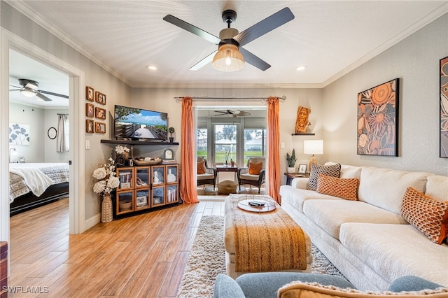 living area with recessed lighting, baseboards, crown molding, and light wood finished floors