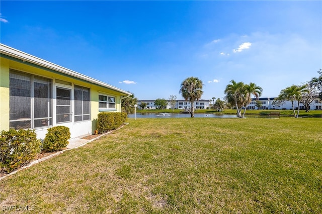 view of yard featuring a water view